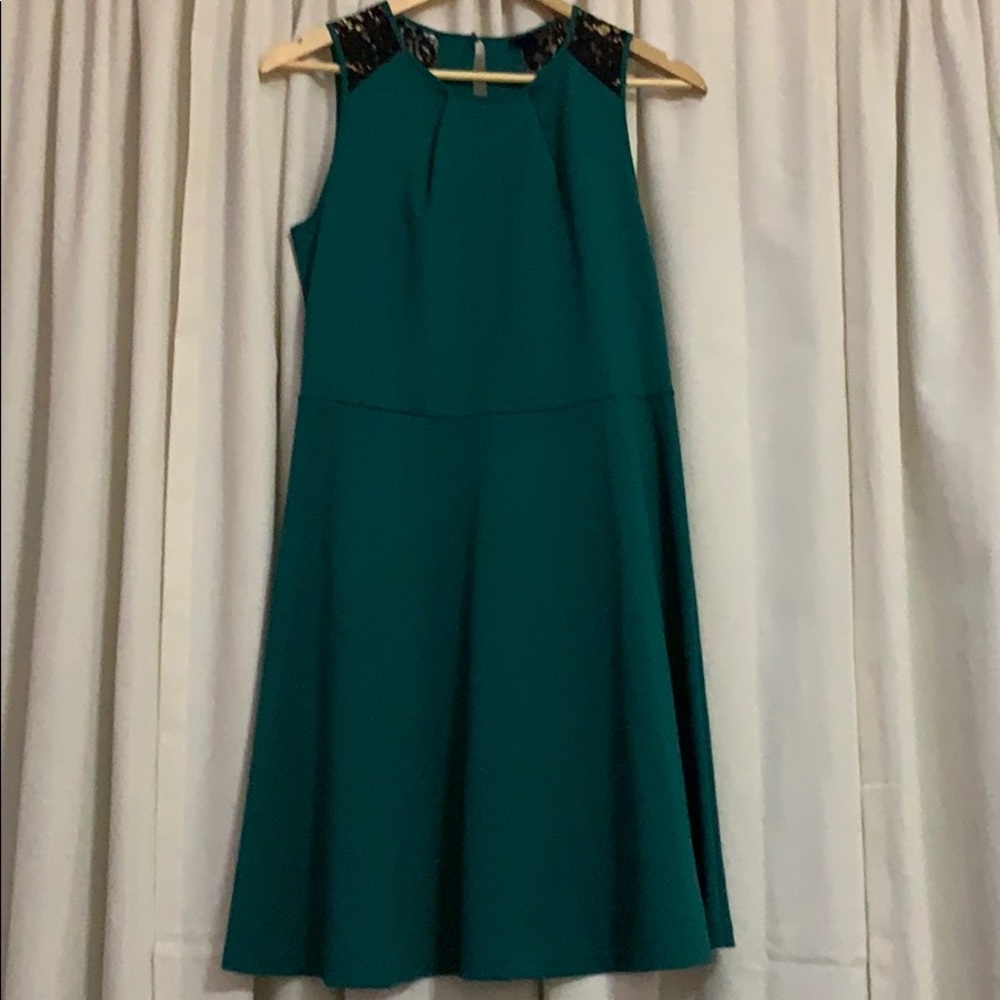 Jewel toned green skater dress with black lace